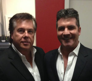 Larry Ryckman with Simon Cowell - music producers.
